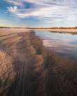 USA, New Jersey, Cape May National Seashore. Water on beach at sunrise. Art Print